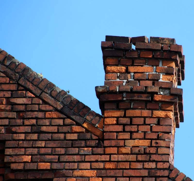 Signs Your El Toro Home Needs a Chimney Inspection Damaged chimney on an El Toro home showing cracks and missing mortar